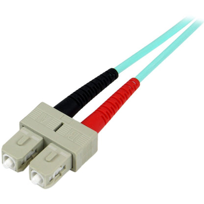 StarTech.com 10m Fiber Optic Cable - 10 Gb Aqua - Multimode Duplex 50/125 - LSZH - LC/SC - OM3 - LC to SC Fiber Patch Cable A50FBLCSC10